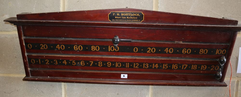 An early 20th century mahogany wall hanging snooker scoreboard by Mortloch, London, W.106m, H.38cm